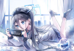  1girl :| absurdres ankle_socks apple aris_(blue_archive) bed_sheet black_hair black_hairband blue_archive blue_eyes blue_halo blue_skirt blue_socks chosunbe closed_mouth collared_shirt commentary_request day dot_mouth dot_nose double-parted_bangs expressionless feet_up flower food from_side fruit full_body hair_between_eyes hairband halo handheld_game_console highres holding holding_handheld_game_console indoors jacket korean_commentary light_particles long_hair long_hair_between_eyes long_sleeves looking_at_object loosely_tucked_bangs lying miniskirt multi-source_commentary no_shoes on_stomach rectangular_halo shirt skirt skyline socks solo the_pose transparent white_flower white_jacket window 