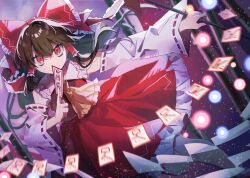  1girl absurdres ascot bamboo bamboo_forest between_fingers blurry bow brown_hair commentary_request danmaku depth_of_field detached_sleeves forest frilled_bow frilled_hair_tubes frills gohei hair_bow hair_tubes hakurei_reimu haruwaka_064 highres holding holding_gohei holding_ofuda imperishable_night long_hair looking_at_viewer nature ofuda ofuda_between_fingers red_bow red_eyes red_skirt ribbon-trimmed_sleeves ribbon_trim skirt skirt_set solo touhou yellow_ascot 