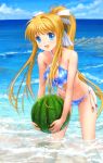  :d air beach bikini blonde_hair blue_eyes blush breasts cleavage collarbone criss-cross_halter food front-tie_top fruit hair_ribbon halter_top halterneck highres holding kamio_misuzu leaning_forward long_hair mound_of_venus mutsuki_(moonknives) ocean open_mouth partially_submerged ponytail ribbon shiny shiny_skin smile solo swimsuit wading water watermelon wet 