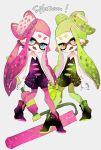  2girls aori_(splatoon) aori_(splatoon)_(cosplay) commentary copyright_name cosplay dress fangs food food_on_head gloves green_legwear grey_background highres holding holding_weapon hotaru_(splatoon) hotaru_(splatoon)_(cosplay) inkling long_hair looking_at_viewer mask multiple_girls object_on_head open_mouth oversized_object paint_roller pantyhose pink_legwear pointy_ears shoes short_dress short_jumpsuit splatoon standing strapless strapless_dress strawberry_natto super_soaker tentacle_hair white_gloves 