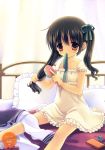  absurdres artist_name bed black_hair cellphone collarbone dress hair_brush hair_brushing hair_ribbon highres mouth_hold original phone pillow red_eyes ribbon scan sitting solo sweets twintails wano 