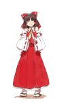  black_hair bow closed_eyes detached_sleeves hair_bow hakurei_reimu hands_together japanese_clothes miko ribbon sandals shiba_murashouji short_hair smile solo standing steepled_fingers touhou 
