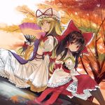  autumn_leaves bare_shoulders blonde_hair blue_eyes boots bow brown_hair detached_sleeves dress fan hair_tubes hakurei_reimu hat hat_ribbon hayama_eishi long_hair looking_at_viewer multiple_girls red_eyes ribbon sitting touhou yakumo_yukari 