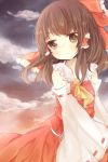  ascot bare_shoulders bow brown_eyes brown_hair detached_sleeves hair_bow hair_tubes hakurei_reimu long_hair skirt solo toadstool_(natadekoko) touhou 