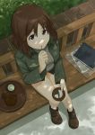  book breasts brown_eyes brown_hair cup eating food from_above green_tea kadomaru_misa looking_up military military_uniform mouth_hold photo_(object) quick10_117117 short_hair sitting smile solo strike_witches tray uniform wagashi 