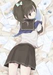  brown_hair copyright_request drawing eraser highres looking_back lying maigo_(neko) on_stomach paper pencil side_ponytail solo 