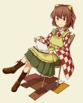  book book_on_lap boots brown_hair chair character_name checkered clothes_writing hair_bobbles hair_ornament kawashina_(momen_silicon) looking_at_viewer motoori_kosuzu open_book red_eyes short_hair sitting smile solo touhou 