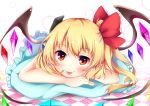  1girl :p black_legwear blonde_hair blush bow checkered checkered_floor flandre_scarlet hair_bow hat highres looking_at_viewer lying on_stomach pillow red_eyes side_ponytail sisterakuma slit_pupils smile solo tongue tongue_out touhou wings 