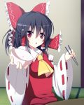 ascot black_hair bow bowl chopsticks detached_sleeves empty food food_on_face hair_bow hair_tubes hakurei_reimu hungry long_hair long_sleeves looking_at_viewer open_mouth outstretched_arm red_eyes rice shefu shirt skirt skirt_set solo tatami touhou wide_sleeves 