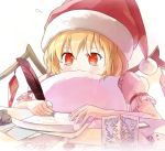  alternate_headwear arctic blonde_hair card christmas_tree feathers flandre_scarlet hat inkwell paper pillow quill red_eyes santa_hat short_hair solo touhou wings writing 