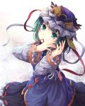  1girl green_eyes green_hair hat hat_ribbon long_sleeves looking_at_viewer mikkii mouth_hold ribbon ribbon_in_mouth shikieiki_yamaxanadu shirt skirt solo touhou tying_hair 