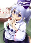  1girl barefoot blue_eyes cake eating food fruit haji_(hajiko) hat japanese_clothes kariginu long_hair mononobe_no_futo ponytail silver_hair skirt solo strawberry tate_eboshi touhou 