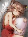  1girl animal_ears bare_shoulders blush brown_hair cat_ears cat_tail chen earrings highres jewelry lying multiple_tails no_hat no_headwear on_side pillow roki_(hirokix) rough short_hair single_earring sleepy sleeveless solo tail touhou 